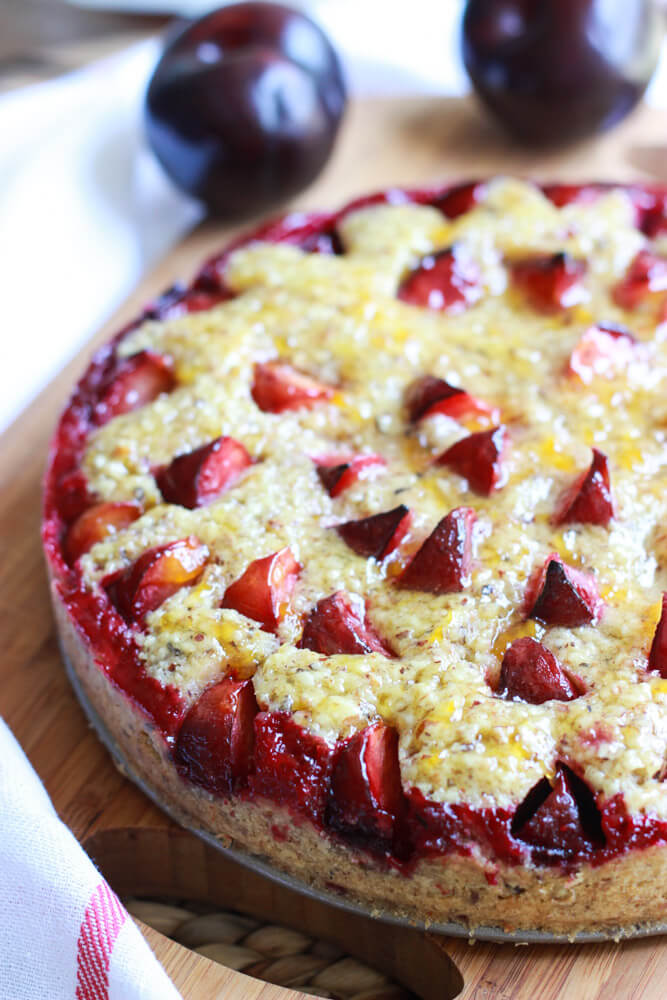 plum torte on a cutting board.