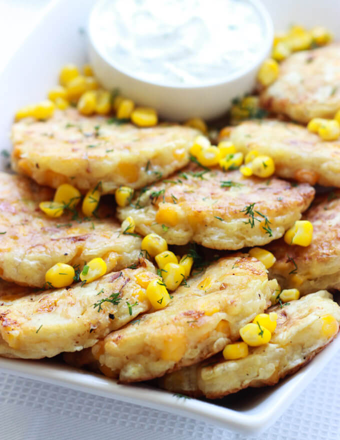 Corn and Bacon Fritters with Garlic-Dill Crema - perfect on the go breakfast or top it with your favorite lunch meat and cheese for yummy school lunch | littlebroken.com @littlebroken