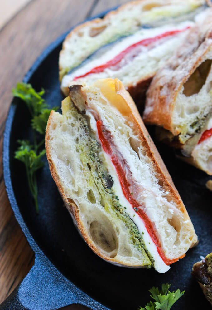 Eggplant, Prosciutto and Pesto Pressed Sandwich - homemade pesto and melt in your mouth prosciutto are just a few layers of this Italian inspired sandwich that's perfect as a lunch or appetizer | littlebroken.com @littlebroken #sandwich #recipe
