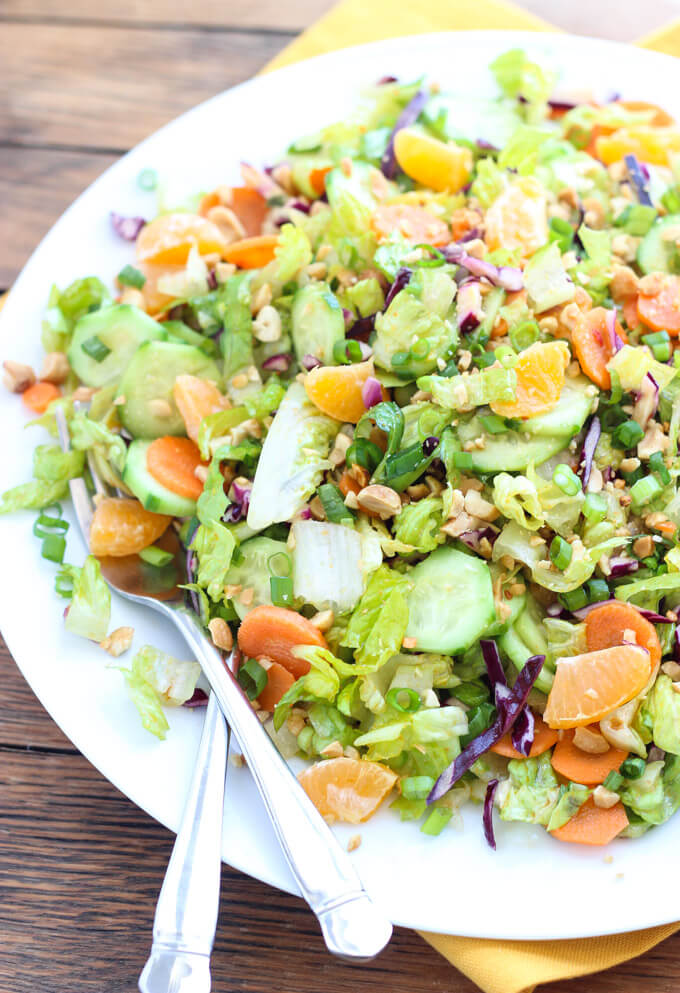 Healthy salad greens combined with crispy veggies and mandarins in a slightly sweet dressing | littlebroken.com @littlebroken