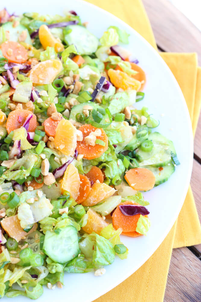 Healthy salad greens combined with crispy veggies and mandarins in a slightly sweet dressing | littlebroken.com @littlebroken
