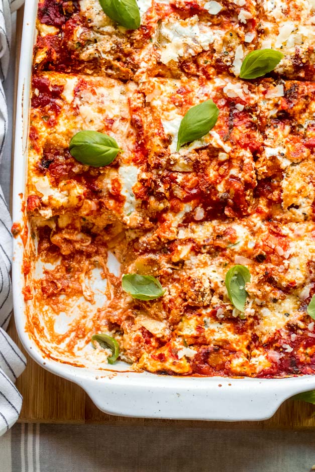 close up turkey sausage lasagna in casserole dish.