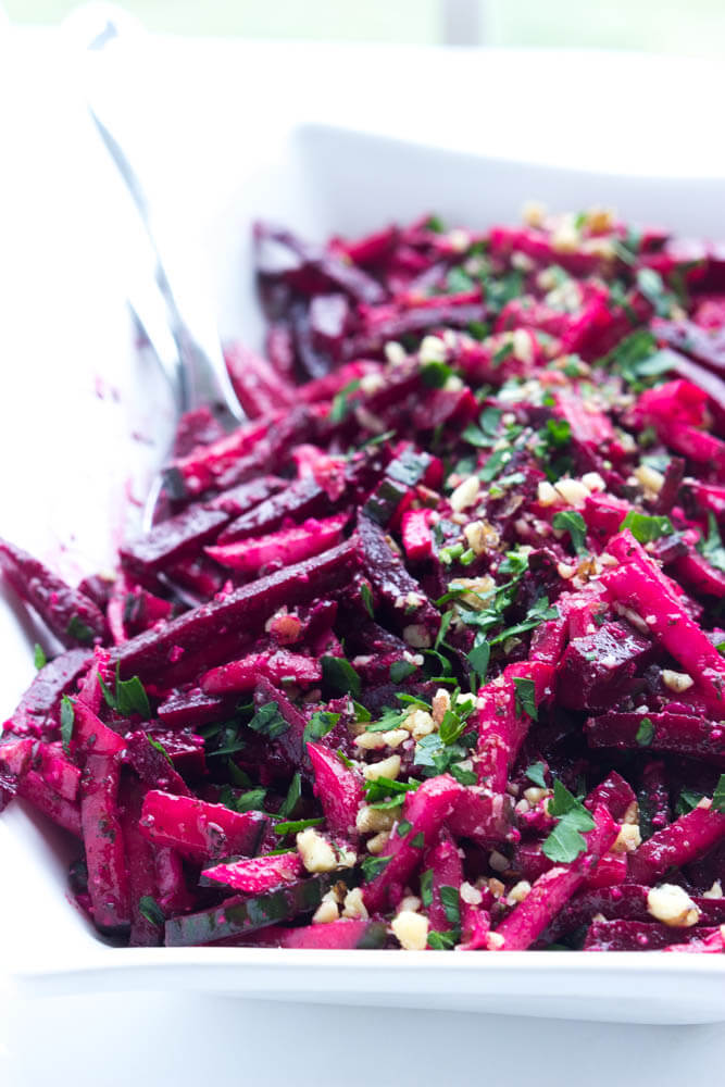 Simple and easy vegetable salad with beets, cucumbers, and radishes, tossed in a crunchy basil pesto vinaigrette | littlebroken.com @littlebroken