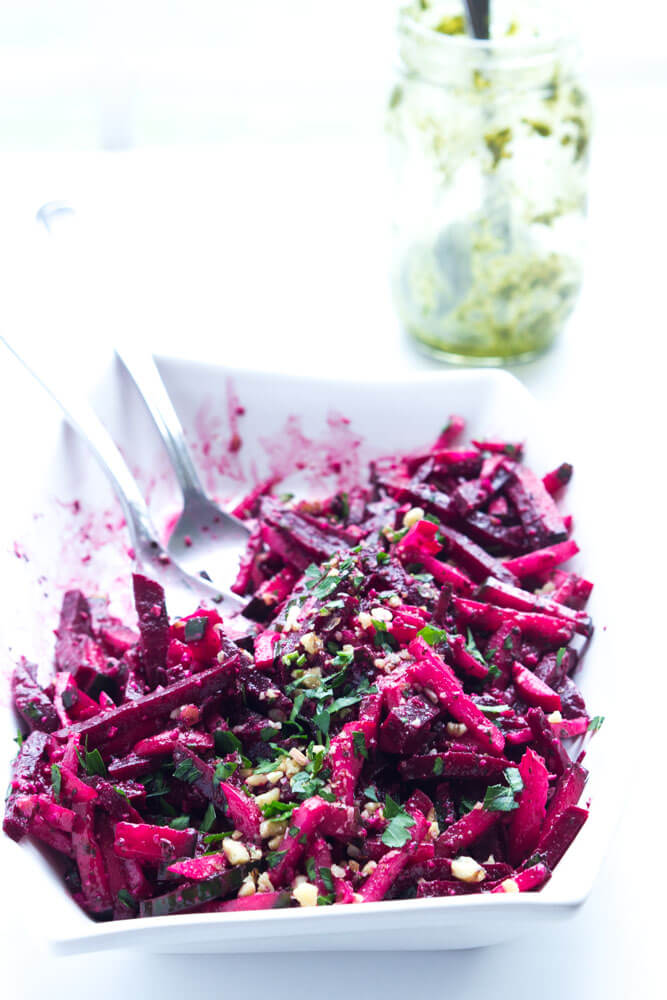 Simple and easy vegetable salad with beets, cucumbers, and radishes, tossed in a crunchy basil pesto vinaigrette | littlebroken.com @littlebroken