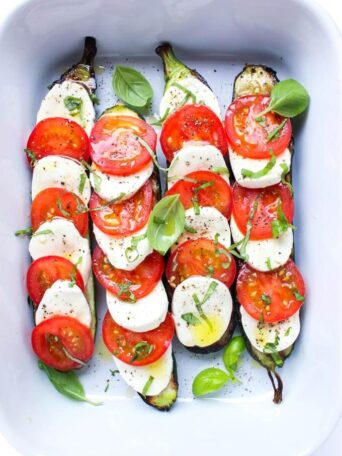 Such an easy summer side! Grilled zucchini topped with caprese: tomatoes, fresh mozzarella, and basil | littlebroken.com @littlebroken
