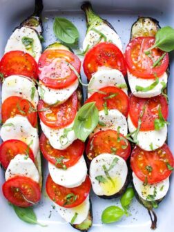 Such an easy summer side! Grilled zucchini topped with caprese: tomatoes, fresh mozzarella, and basil | littlebroken.com @littlebroken