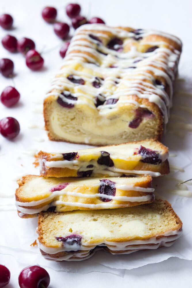 Super moist and flavorful 5 layer coffee cake, made with buttermilk cake layer, cream cheese filling, sweet fresh cherries, and the BEST cream cheese glaze | littlebroken.com @littlebroken