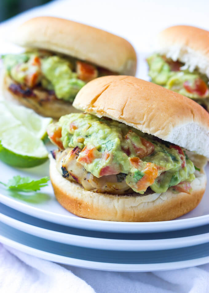 Super juicy chicken thighs grilled and topped with tomato guacamole for easy weeknight dinner | littlebroken.com @littlebroken.com