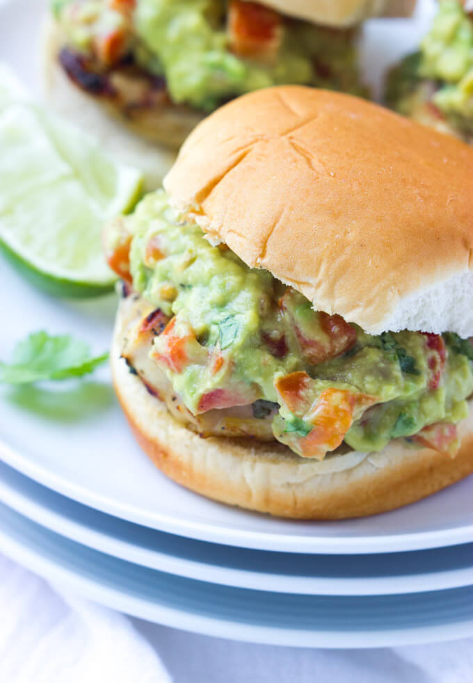Super juicy chicken thighs grilled and topped with tomato guacamole for easy weeknight dinner | littlebroken.com @littlebroken.com