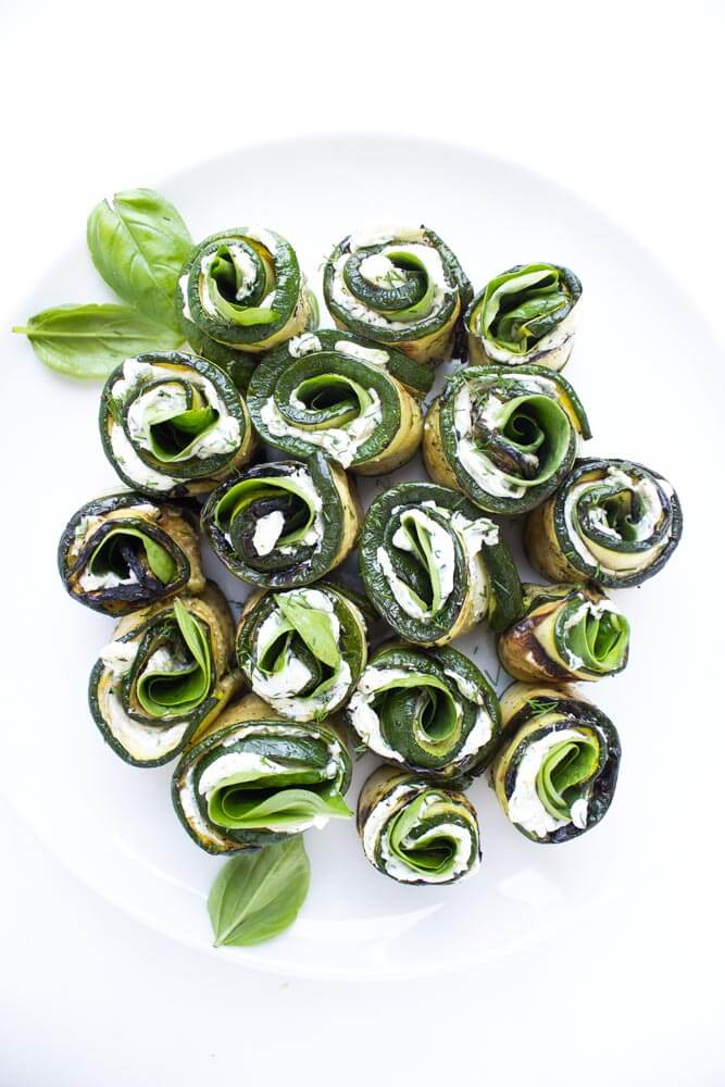 Grilled zucchini filled with herby cream cheese, baby spinach, and aromatic basil. Easy yet elegant side dish or appetizer | littlebroken.com @littlebroken