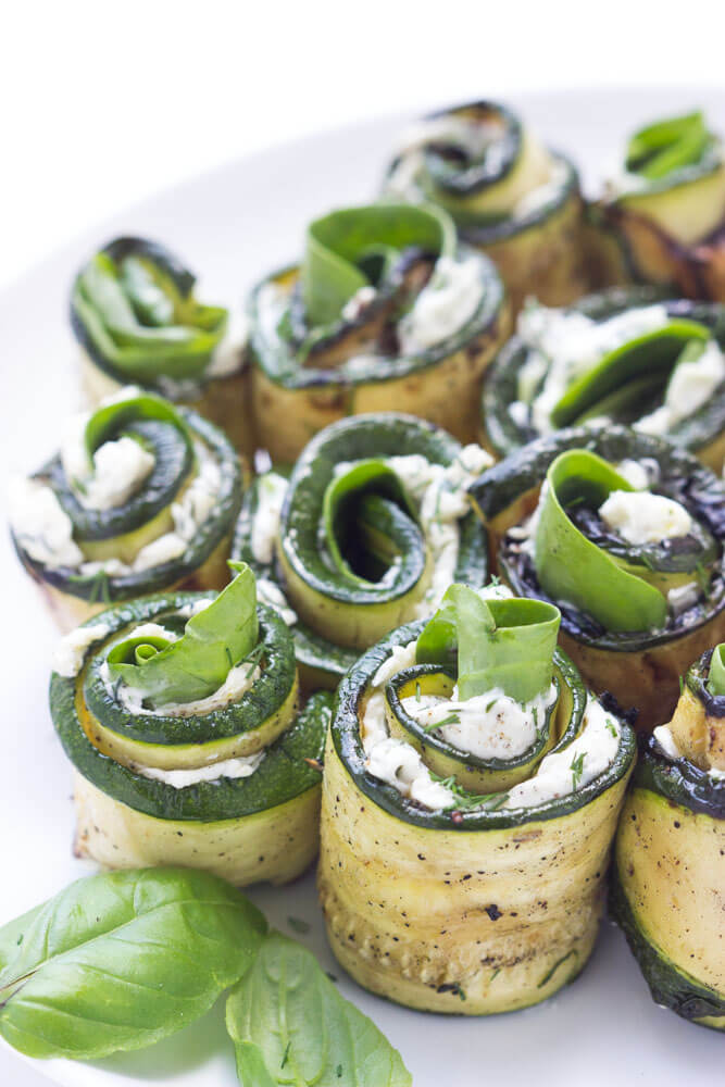 Grilled zucchini filled with herby cream cheese, baby spinach, and aromatic basil. Easy yet elegant side dish or appetizer | littlebroken.com @littlebroken