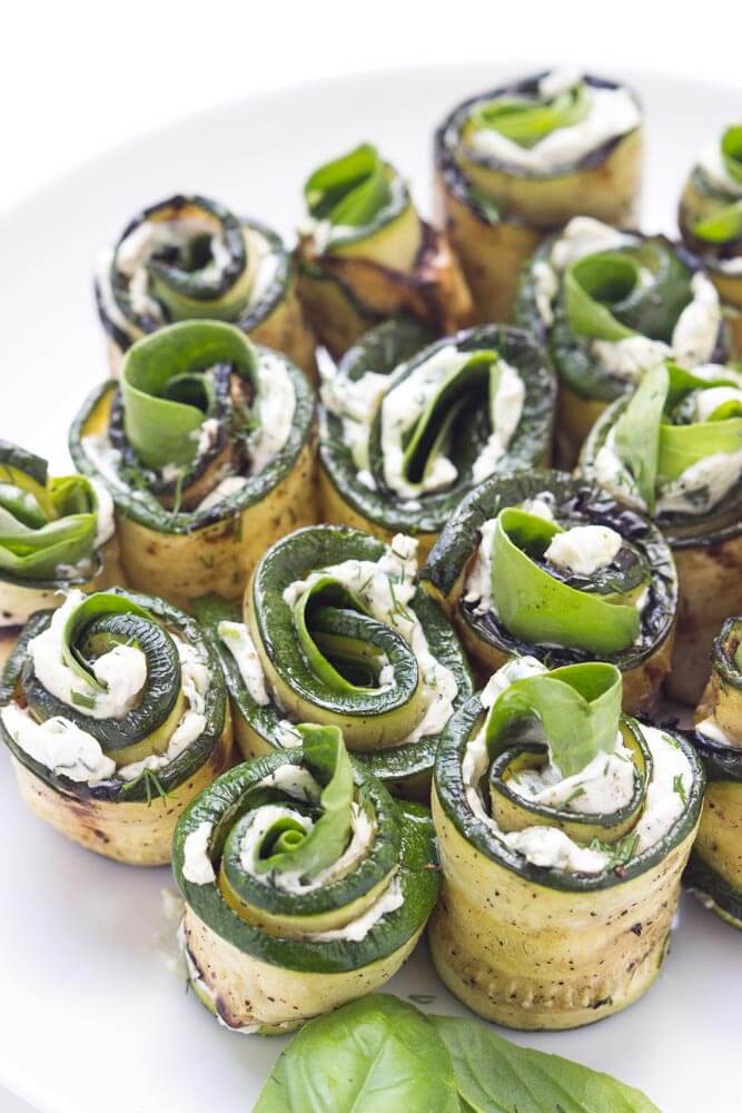 Grilled zucchini filled with herby cream cheese, baby spinach, and aromatic basil. Easy yet elegant side dish or appetizer | littlebroken.com @littlebroken