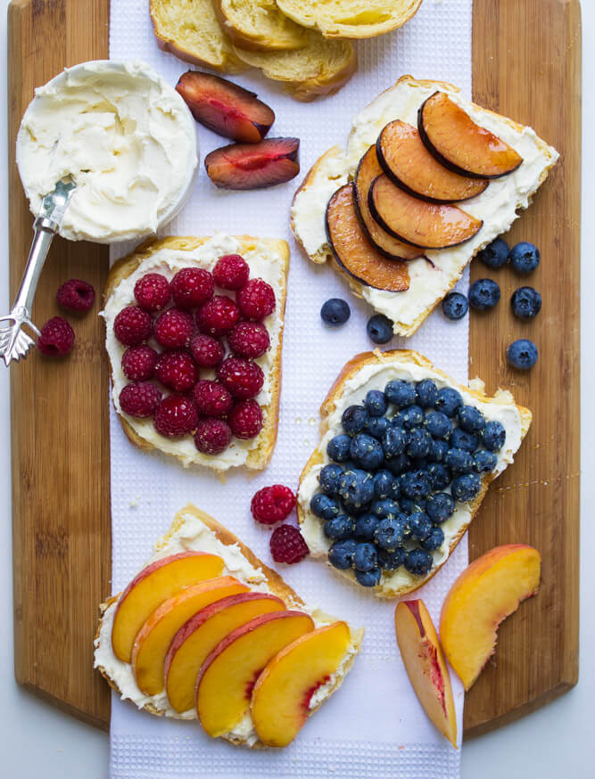 toast topped with sliced fruit.