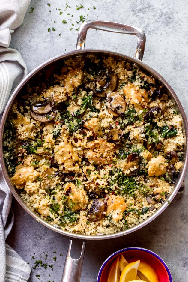 overhead chicken quinoa spinach in saute pan