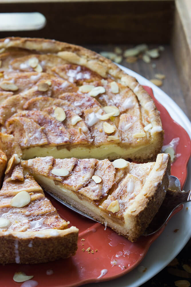 close up of apple tart slice on a fork.