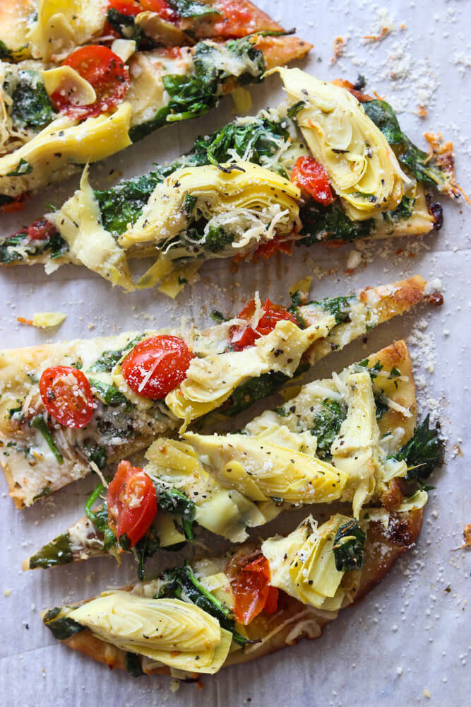 Spinach Flatbread Pizza - Prosciutto + Spinach Flatbread Pizza - Revel and Glitter - Top with scrambled eggs, tomatoes and spinach, dividing.