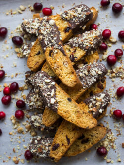 Dark Chocolate Cranberry Almond Biscotti - dunkable, crunchy, packed with almonds and cranberries, then dipped in dark rich chocolate. So addicting and full of flavor | littlebroken.com @littlebroken