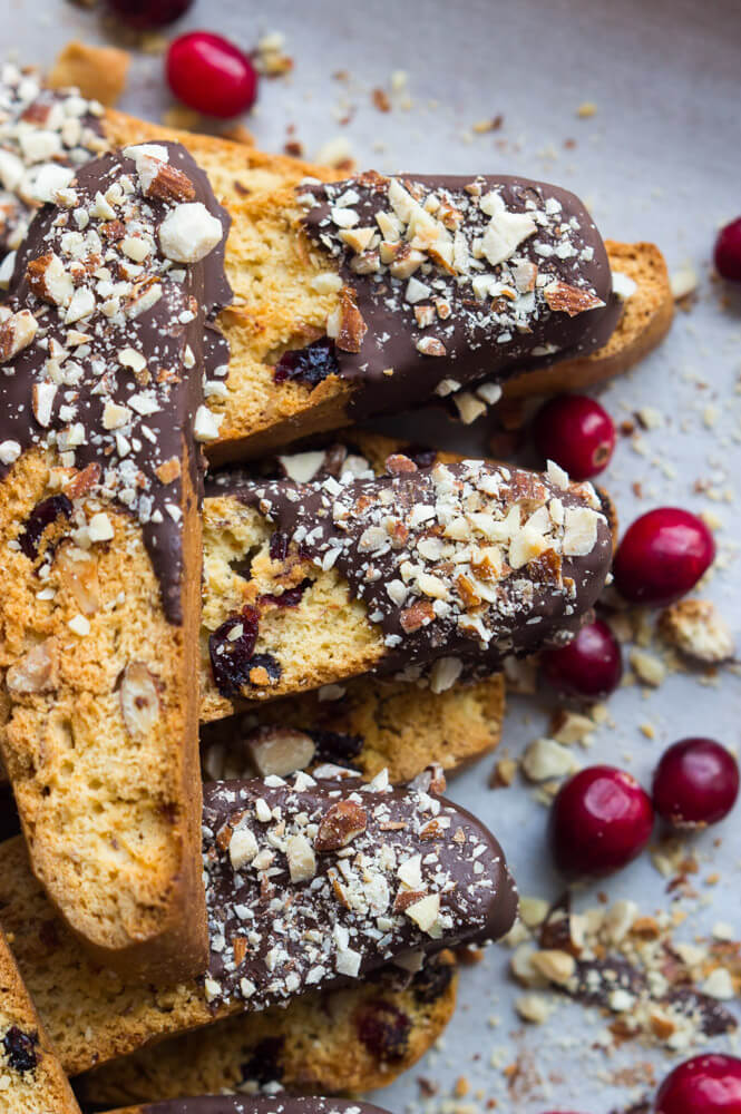 Dark Chocolate Cranberry Almond Biscotti - dunkable, crunchy, packed with almonds and cranberries, then dipped in dark rich chocolate. So addicting and full of flavor | littlebroken.com @littlebroken