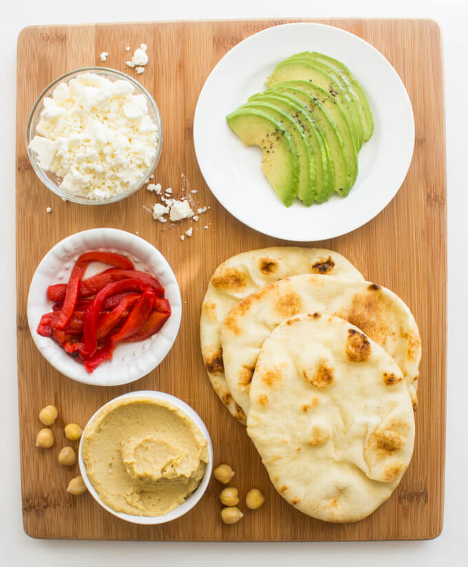 Hummus Naan Toast 3 Ways - give your morning toast a makeover with this easy naan bread. Simple, fresh and veggie loaded toppings will surely keep you full and healthy! | littlebroken.com @littlebroken