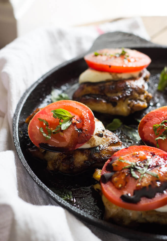 Close up easy caprese chicken in pan. 