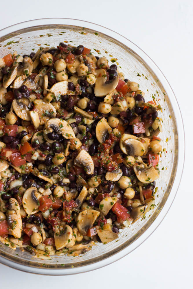 Mediterranean Bean Salad with Mushrooms - this side is a flavor bomb! So easy to make with simple ingredients. Plus it's vegetarian and vegan! | littlebroken.com @littlebroken