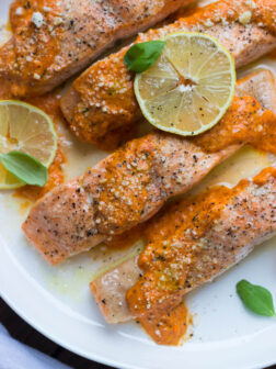 Oven Roasted Salmon with Red Pepper Sauce - flaky salmon with creamy savory-sweet red pepper sauce. Easy and delicious salmon dinner! | littlebroken.com @littlebroken