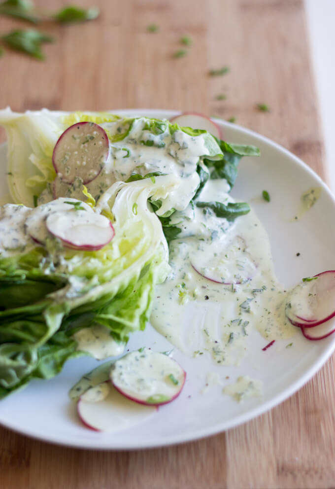 close up of salad with green goddess salad dressing
