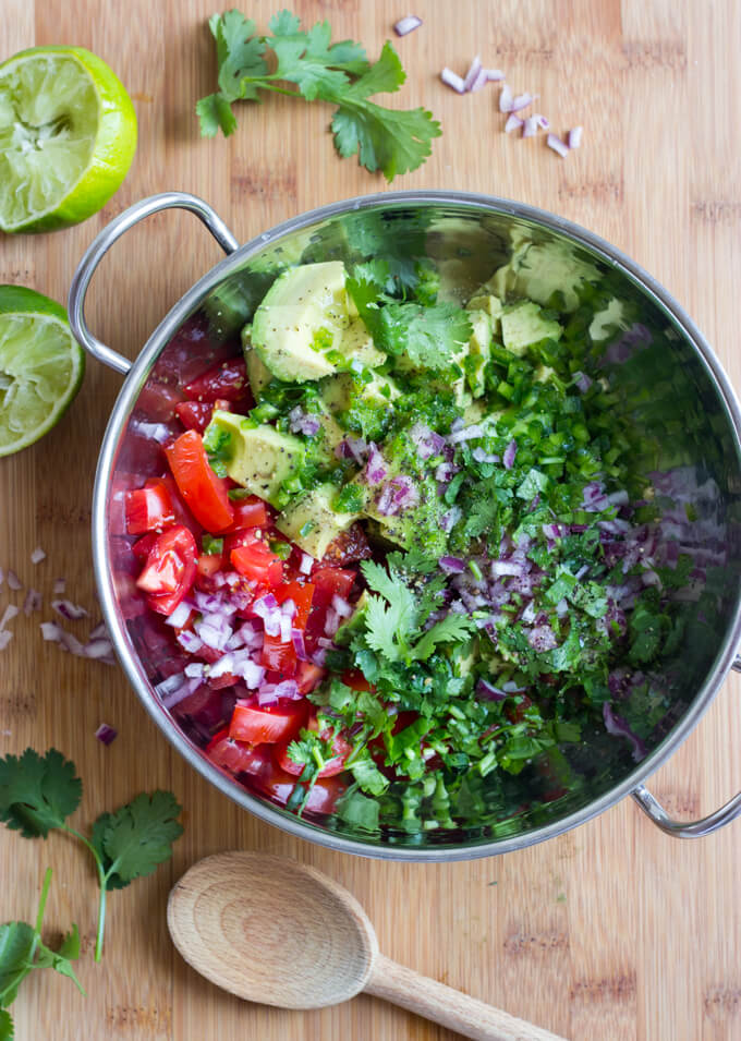 Oven Roasted Chili Lime Salmon with Avocado Salsa - chili lime marinated salmon, roasted in the oven, then topped with fresh avocado tomato salsa. Such easy weeknight dinner! | littlebroken.com @littlebroken