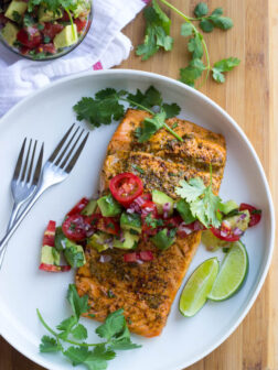 Oven Roasted Chili Lime Salmon with Avocado Salsa - chili lime marinated salmon, roasted in the oven, then topped with fresh avocado tomato salsa. Such easy weeknight dinner! | littlebroken.com @littlebroken