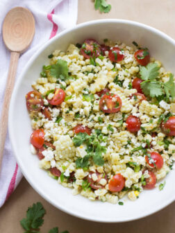 Fresh Sweet Corn Salad with Tomatoes and Feta - the best corn salad to compliment all of your BBQ dishes! | littlebroken.com @littlebroken