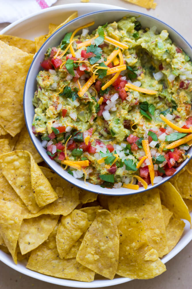 Cheesy Guacamole - traditional guacamole but with cheese! | littlebroken.com @littlebroken