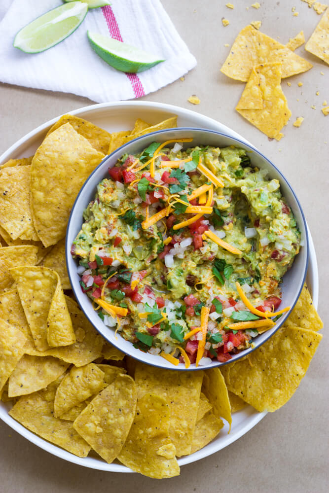 Cheesy Guacamole - traditional guacamole with cheese! | littlebroken.com @littlebroken