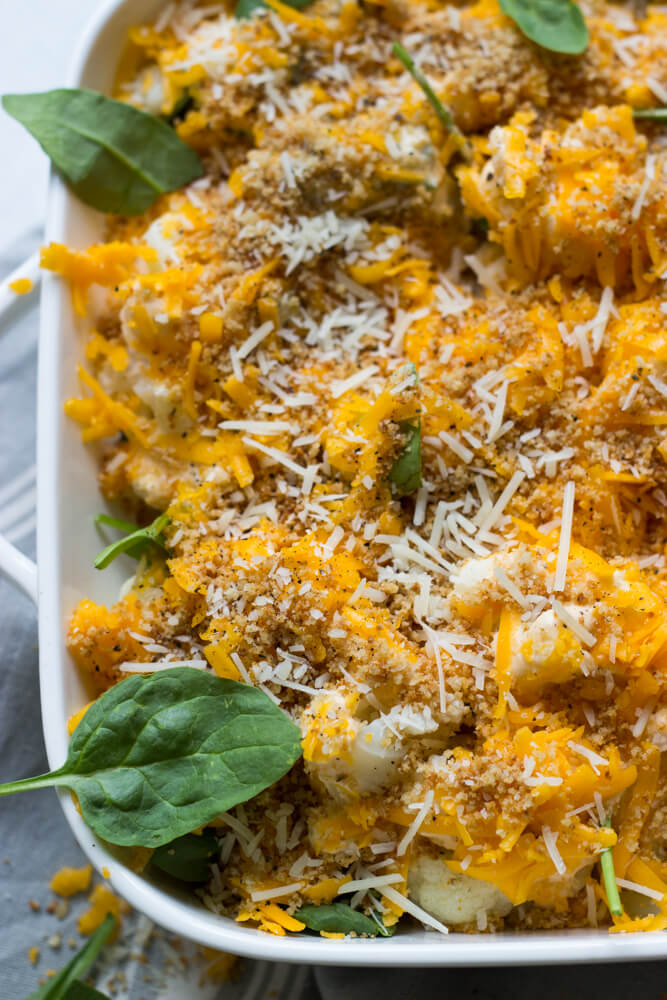 overhead cauliflower and spinach in cheese sauce