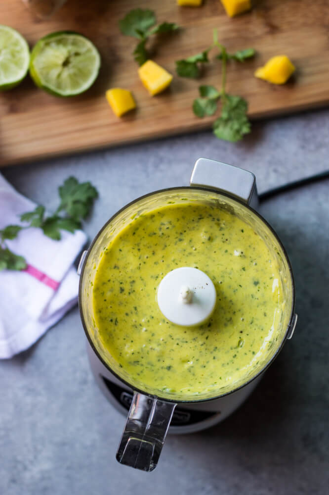 Mango Cilantro Dressing - vibrant, tangy, and little spicy salad dressing that is so good over spicy anything! | littlebroken.com @littlebroken