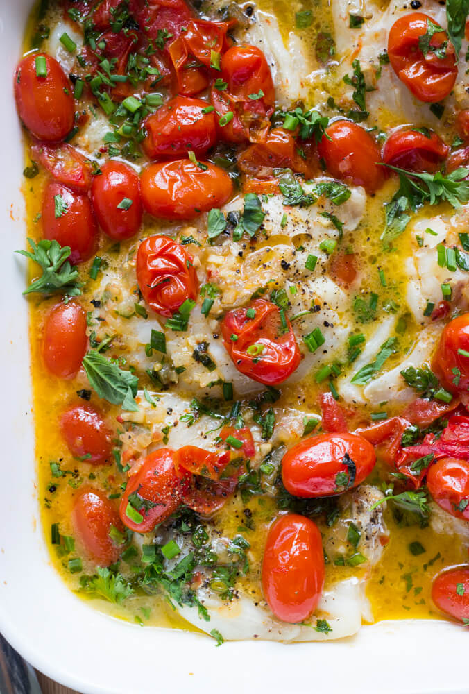 Cod with Tomato and Herb Butter - the best cod recipe you will ever make! Flavorful, flaky, and tender. 