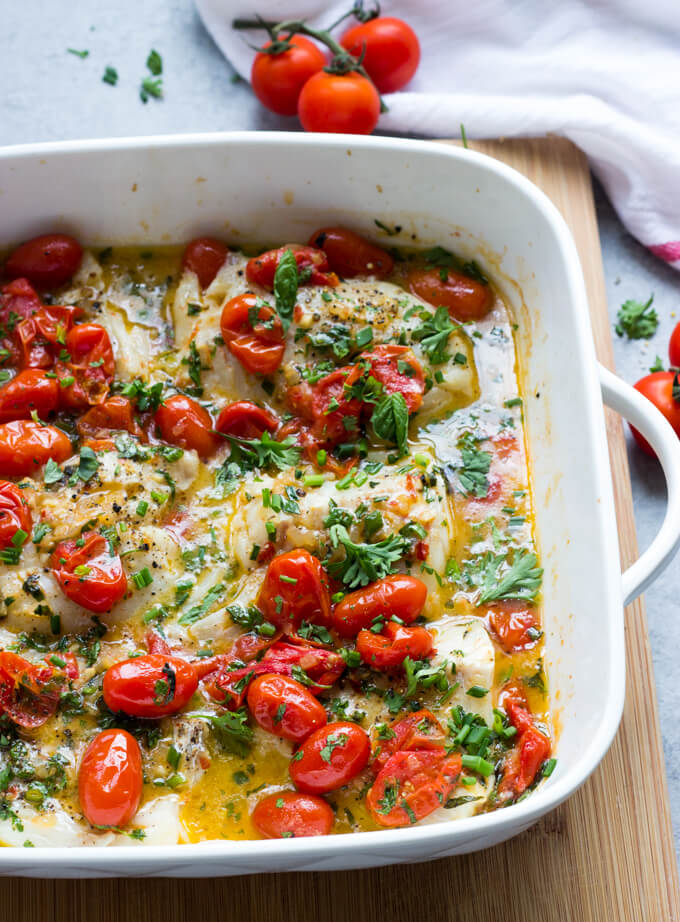 Cod with Tomato and Herb Butter - the best cod recipe you will ever make! Flavorful, flaky, and tender. Plus at only 278 cal | littlebroken.com @littlebroken