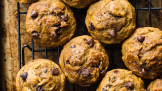 Healthy Chocolate Chip Pumpkin Muffins - made with coconut oil, white whole wheat flour, and sweetened with honey. These are by far the BEST healthy pumpkin muffins | littlebroken.com @littlebroken