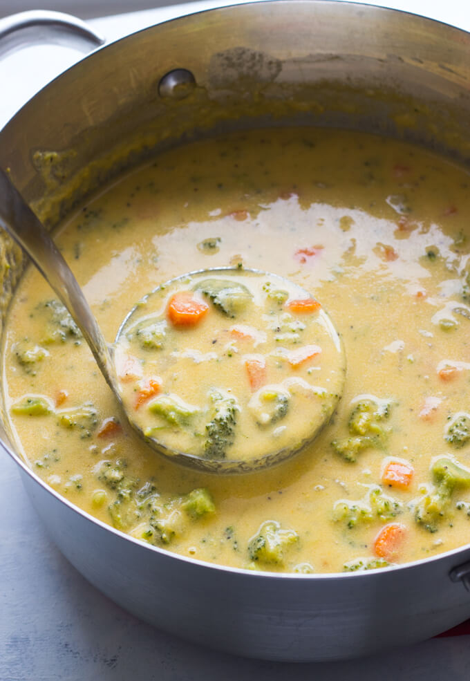 Close up broccoli cheddar soup recipe in a dutch oven