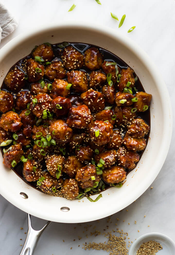 asian chicken meatballs in sauce.