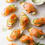 Smoked Salmon and Herb Cheese Crostini - easy and elegant appetizer to add to your holiday table! | littlebroken.com @littlebroken