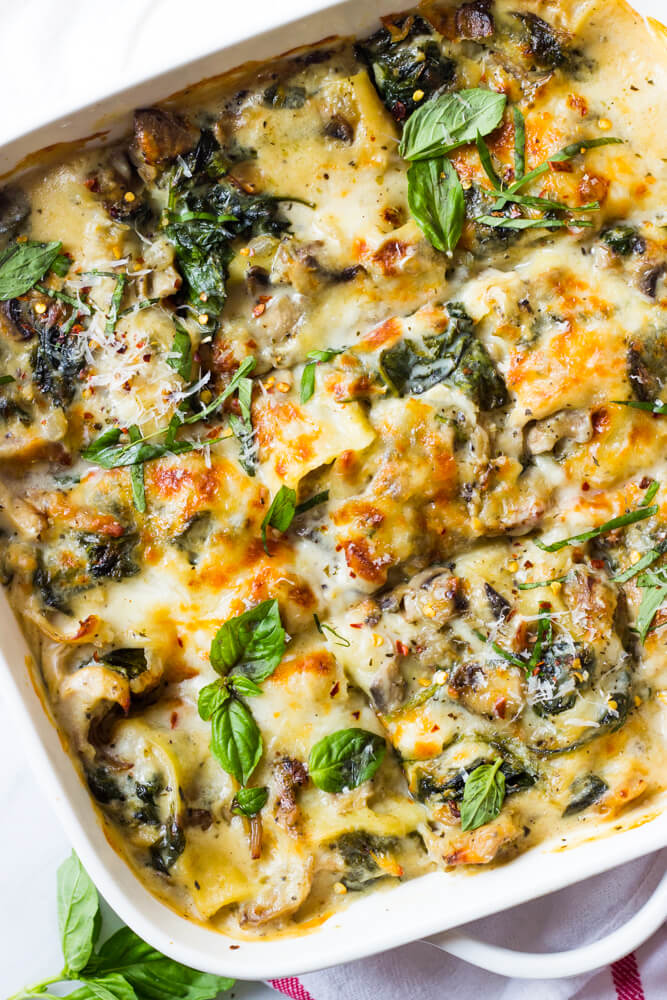 Chicken Spinach Lasagna - made with shredded chicken, fresh spinach, mushrooms, and light sauce 