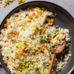 mexican white rice with corn and peas