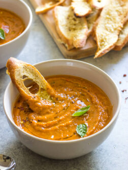Creamy Roasted Tomato and Basil Soup - creamy tomato soup without any cream or cream alikes! So rich, buttery, yet light | littlebroken.com @littlebroken