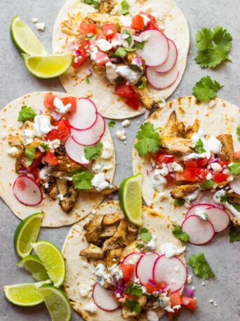 Easy Grilled Chicken Tacos - these tacos are made with thighs instead of breast, which makes them insanely juicy, flavorful, and they cook in fraction of time! | littlebroken.com @littlebroken