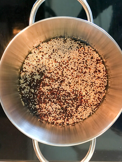 quinoa in water inside a pot.