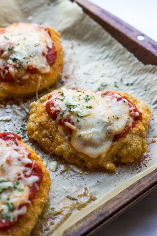 Baked Chicken Parmesan - lightly breaded chicken breast topped with marinara sauce and cheese, then baked until tender crisp. It's healthy and quick to make! | littlebroken.com @littlebroken