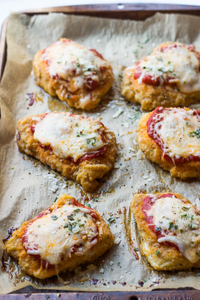 Baked Chicken Parmesan - lightly breaded chicken breast topped with marinara sauce and cheese, then baked until tender crisp. It's healthy and quick to make! | littlebroken.com @littlebroken