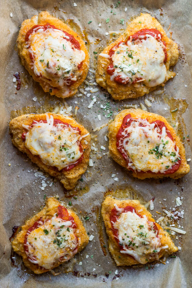 Baked Chicken Parmesan - lightly breaded chicken breast topped with marinara sauce and cheese, then baked until tender crisp. It's healthy and quick to make! | littlebroken.com @littlebroken