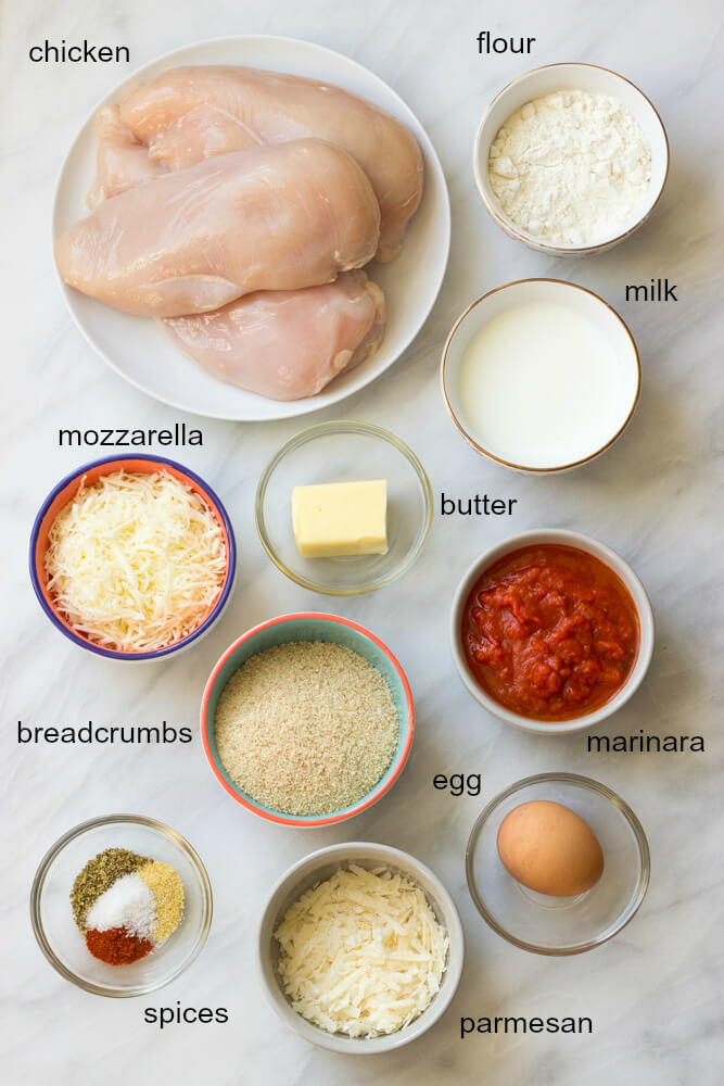 Baked Chicken Parmesan - lightly breaded chicken breast topped with marinara sauce and cheese, then baked until tender crisp. It's healthy and quick to make! | littlebroken.com @littlebroken