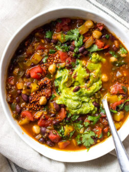 black bean quinoa chili in a white bowl